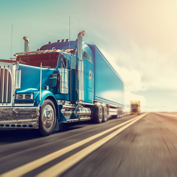 The truck runs on the highway. The truck runs on the highway with speed. 3d render and illustration.